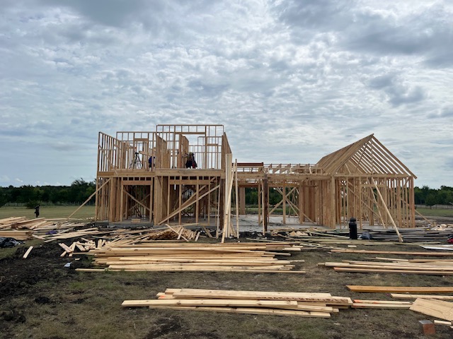 Custom home framing under construction in Fannin County, North Texas